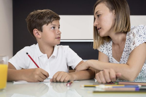 mother-helping-son-with-homework-scaled-1.jpg